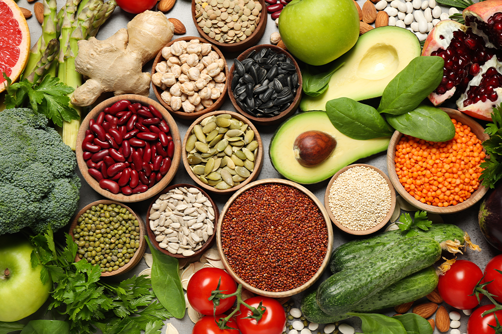 a table full of grains, fruits and vegetables